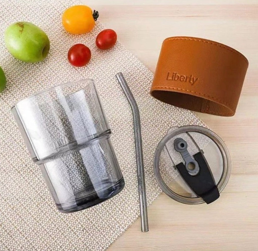 Transparent glass mug with straw