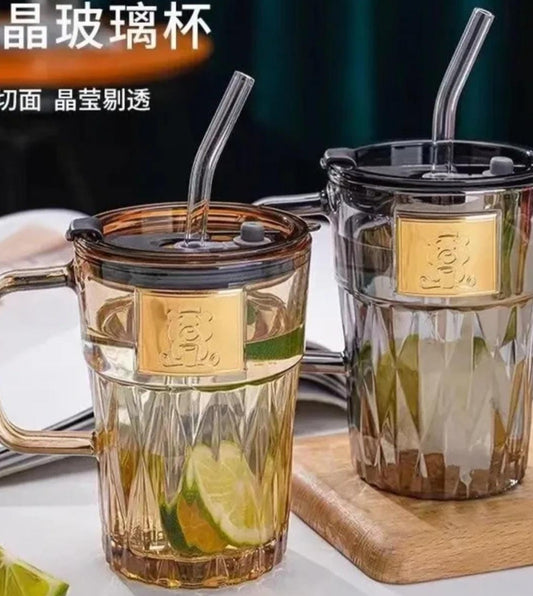 Glass mug with straw and lid