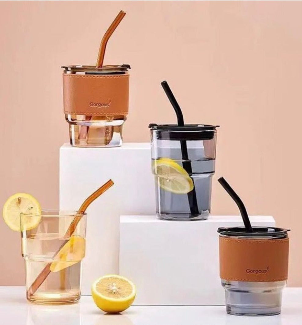 Transparent glass mug with straw