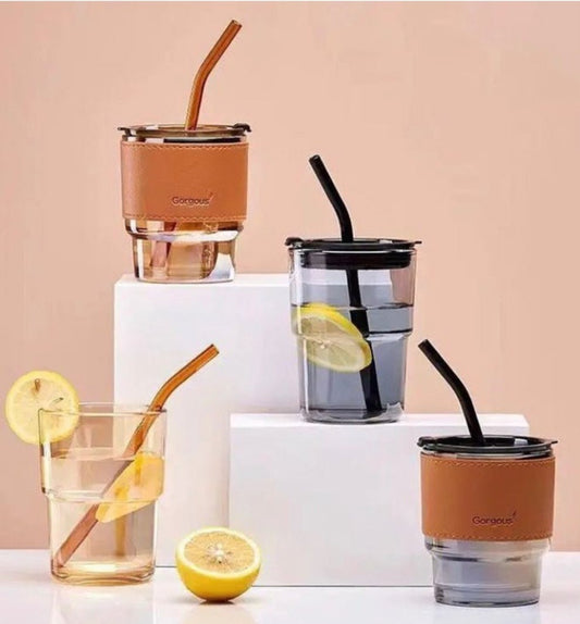 Transparent glass mug with straw