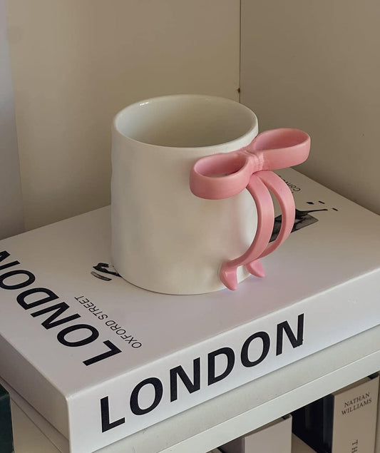 Pink bow handed cearmic mug
